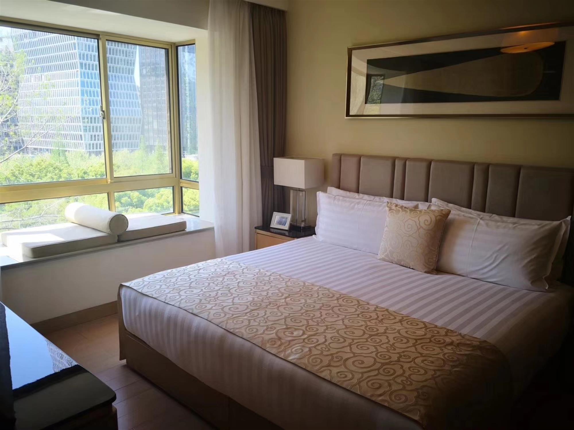 big bed High-End Gubei Service Apartments Available in Shanghai