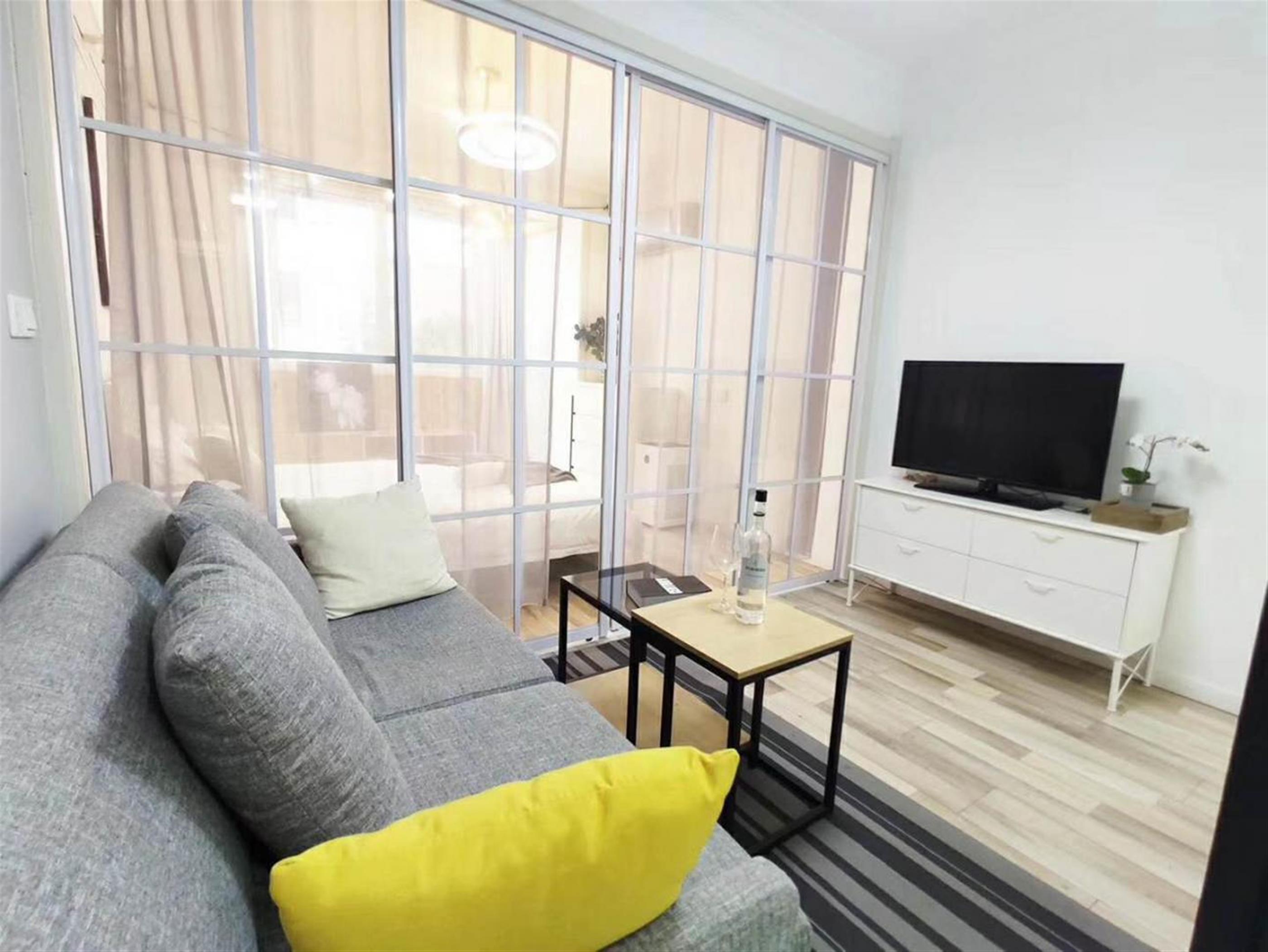 Bright living room Renovated Affordable Cozy 50sqm Xinhua Road Apt nr LN 3/4/10 for Rent in Shanghai