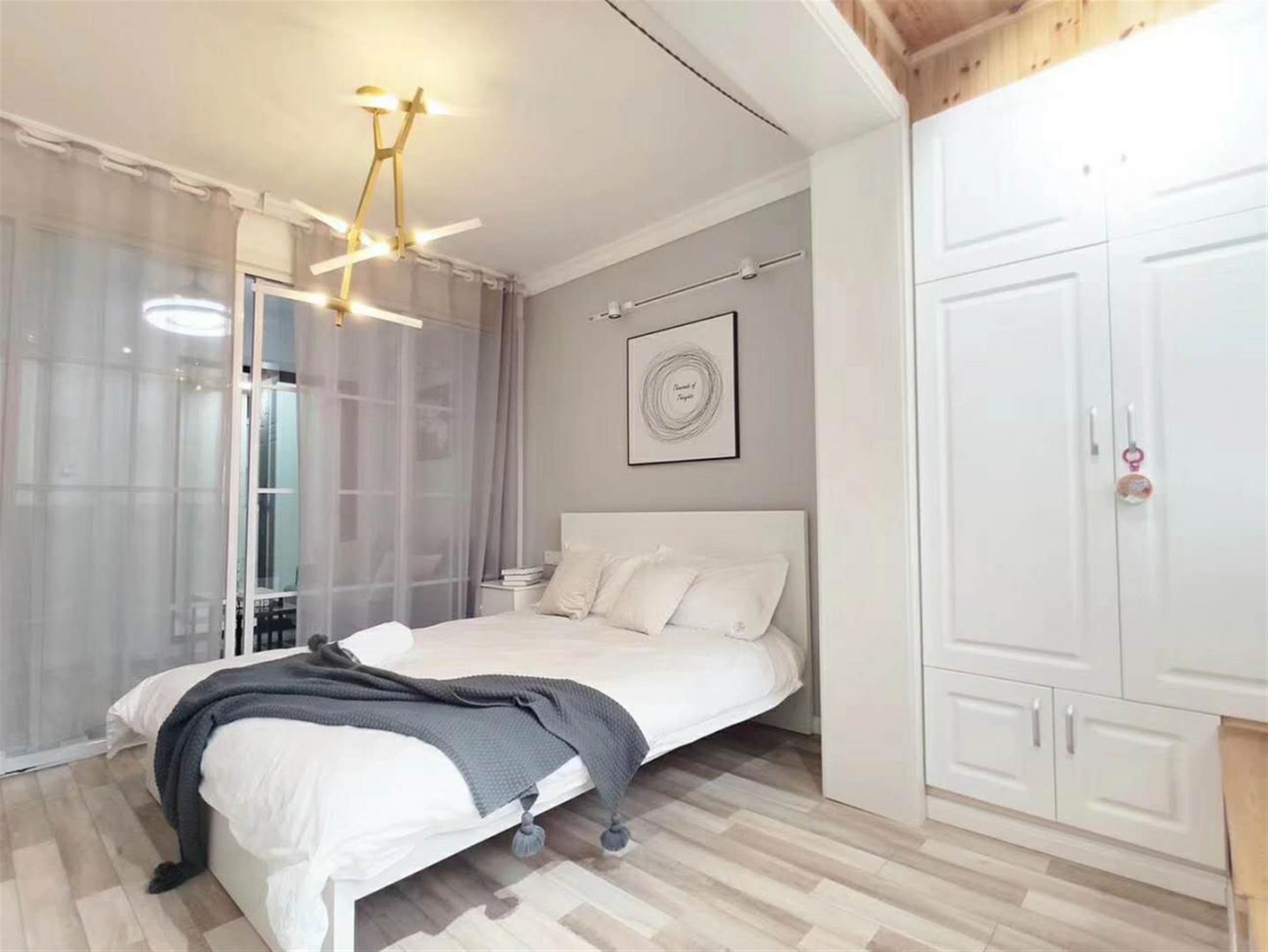 large bedroom Renovated Affordable Cozy 50sqm Xinhua Road Apt nr LN 3/4/10 for Rent in Shanghai