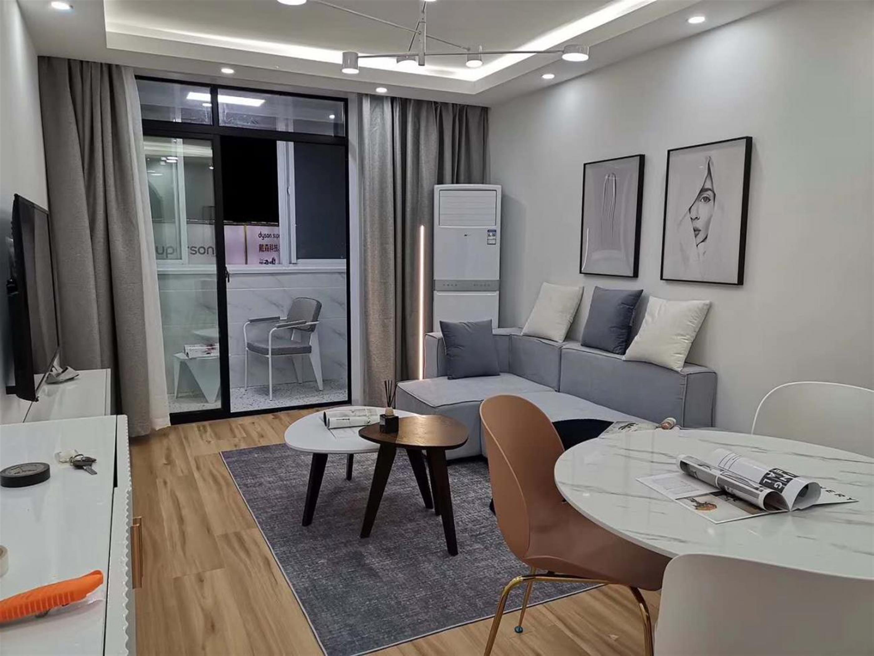 spacious living room Renovated Bright 2BR Apt Nr LN 1/4 in Shanghai for Rent