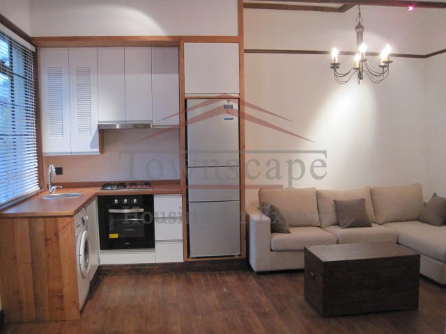 lane house rentals in shanghai Old renovated apartment with balcony on Middle Huaihai road