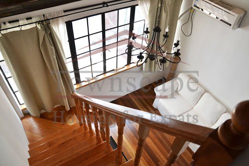flats rentals in shanghai with terrace 2 level renovated apartment with terrace and wall heating for rent on Shanxi road