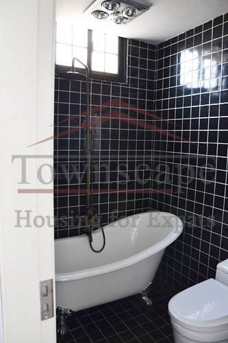 rent birght house in shanghai 2 level renovated apartment with terrace and wall heating for rent on Shanxi road