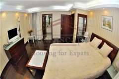 Spacious furnished apartment with polished wooden floorboards