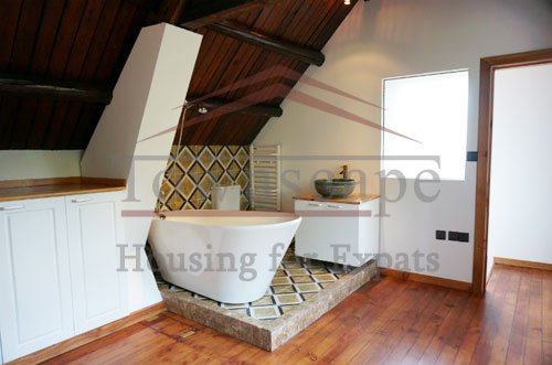 stylish apartment rentals in shanghai Two floor unfurnished apartment with wall heating for rent on Wukang road