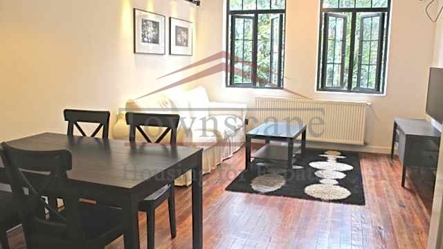 open plan living shanghai Stylish French Concession Lane House with hardwood floor