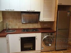 Old Shanghai apartment for rent with clean kitchen Old Apartment with Shikumen entry and floor heating on Yongkang Road