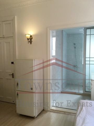 Shanghai studio for rent Renovated high-ceiled Lane House Studio on Ruijin Er Rd