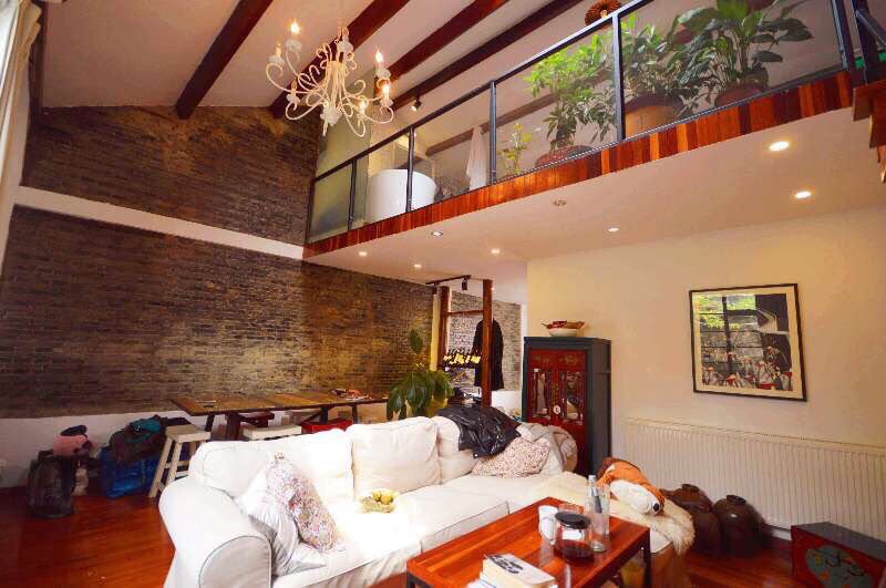 Open living room with loft Spacious FFC Lane House Apartment with Terrace for Rent in Shanghai