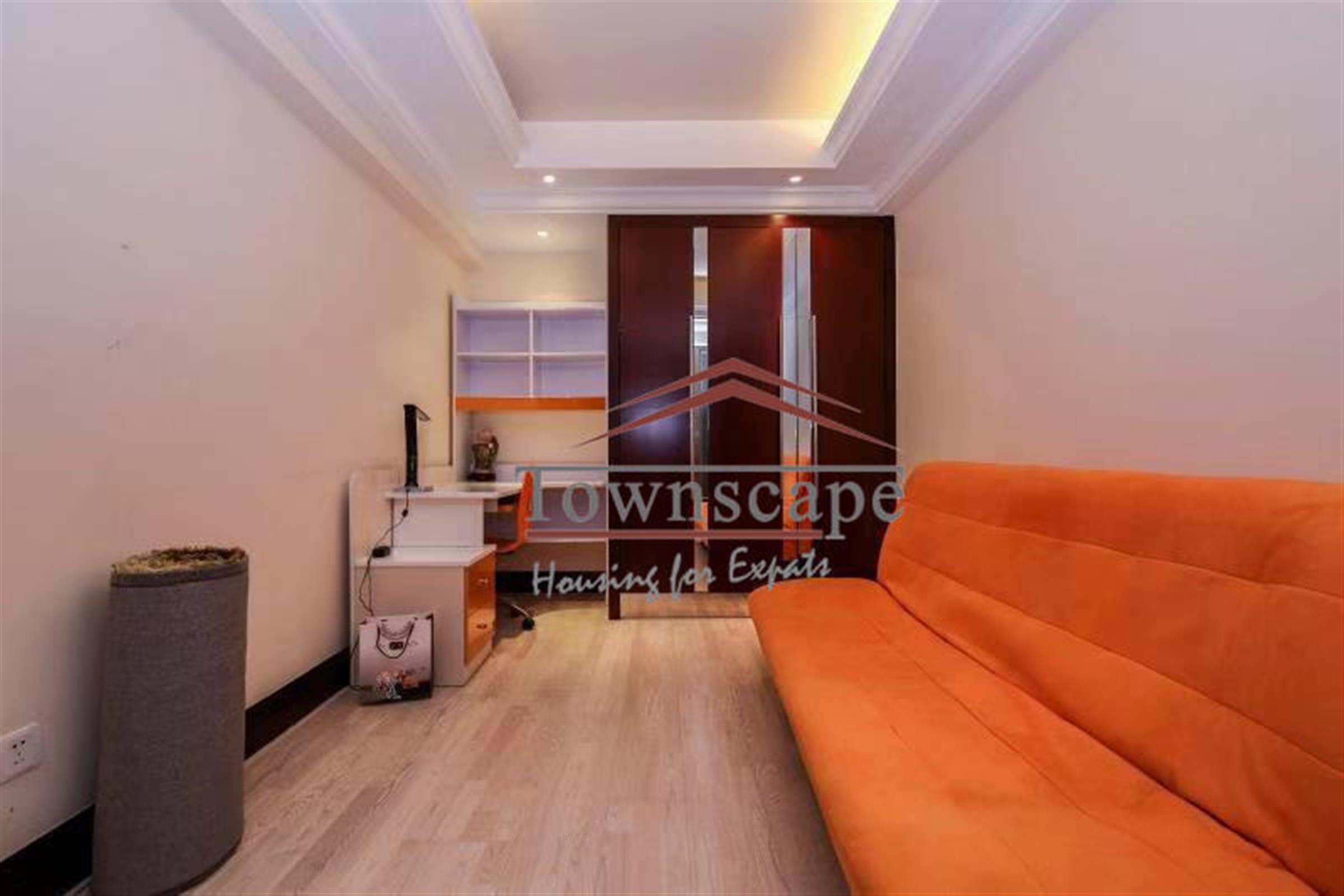 orange sofa Comfy Renovated Seasons Villas for Rent in Pudong, Shanghai