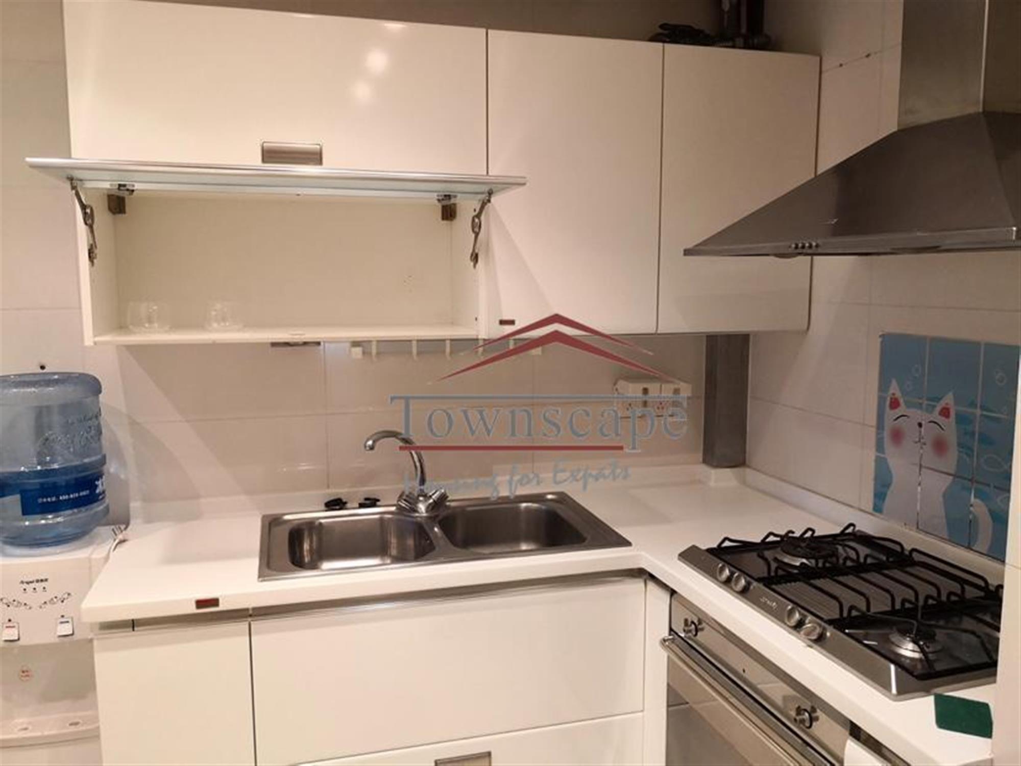 clean kitchen Spacious Newly Decorated Jing’an Apartment for Rent in Shanghai