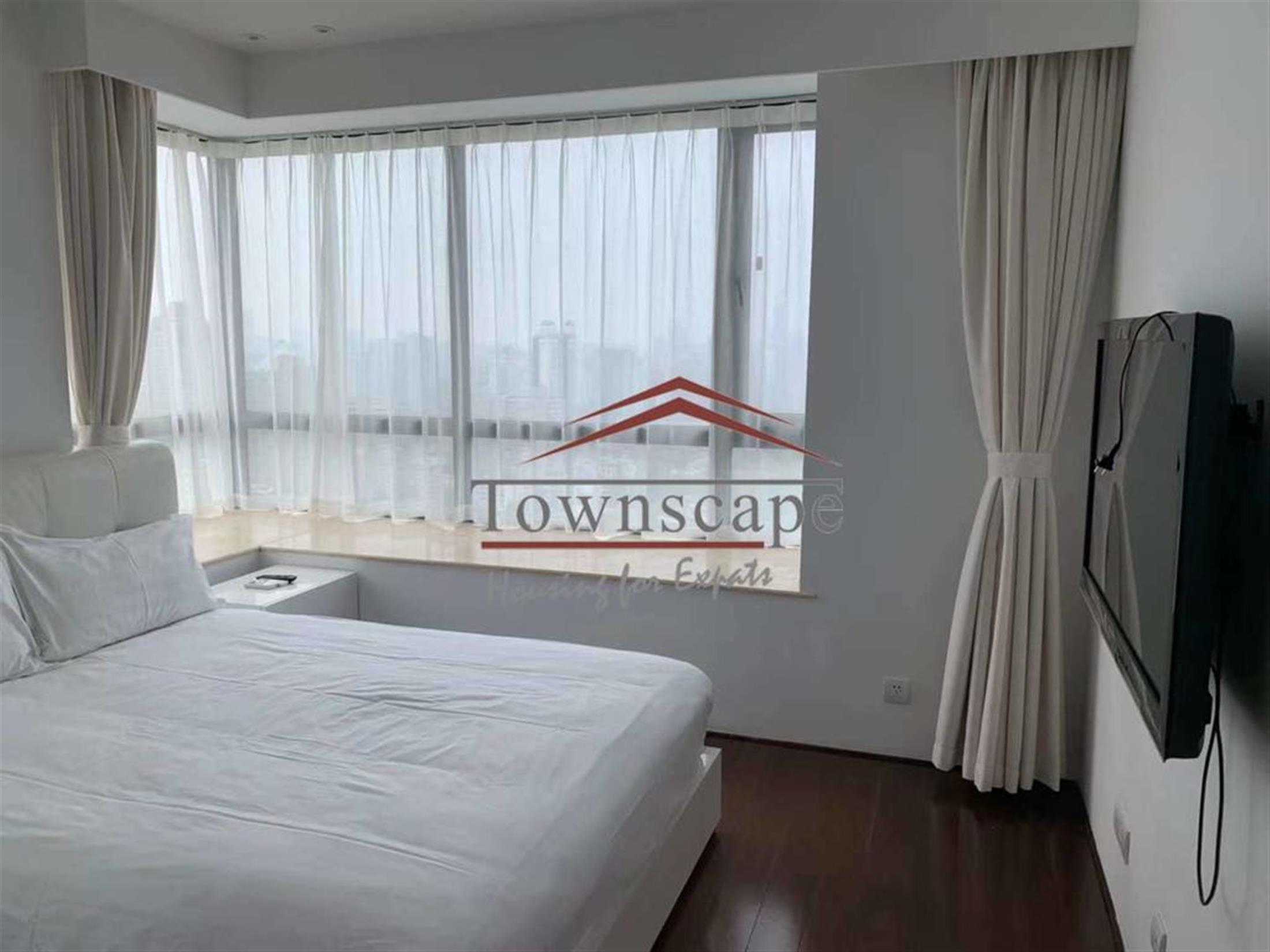 new bed Spacious Parkside Xujiahui Apartment for Rent in Shanghai