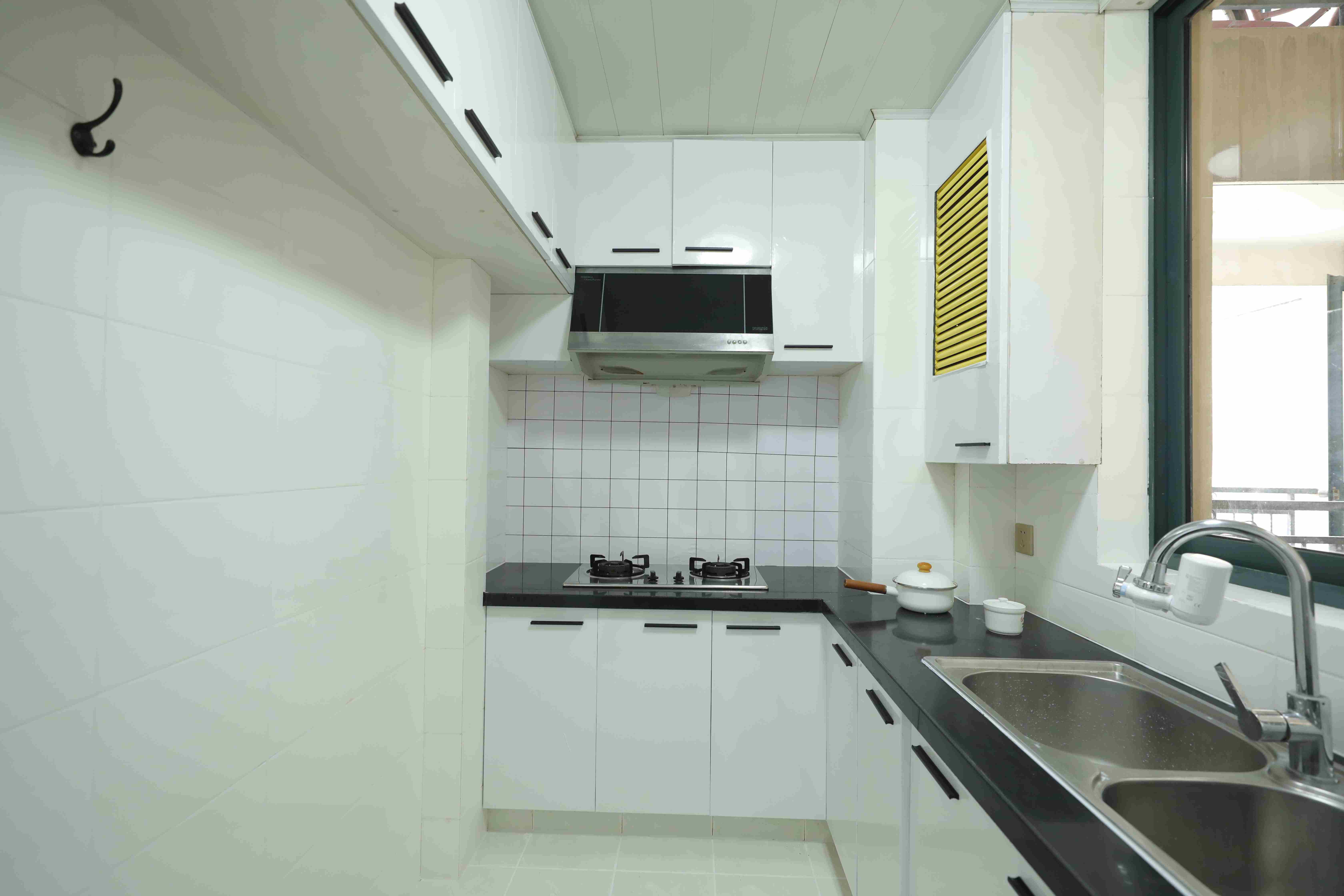 clean kitchen New Spacious Bright Laoximen Apartment for Rent in Shanghai
