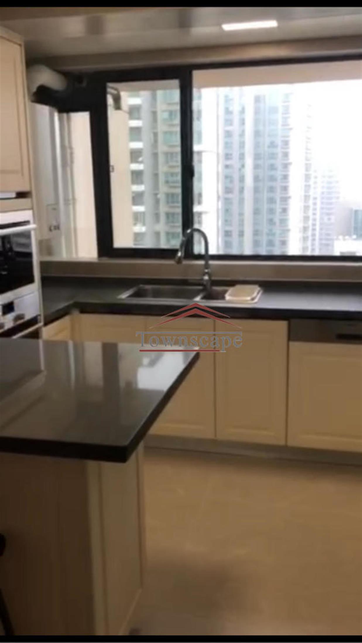 kitchen island Newly Renovated One Park Ave Apartment in Jing’an, Shanghai for Rent