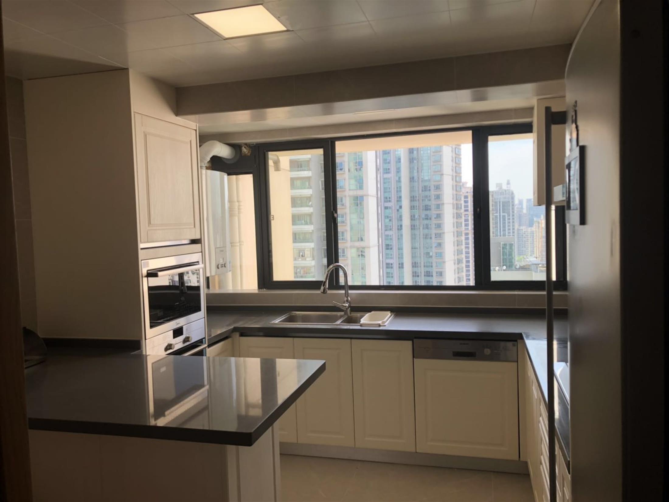 large open kitchen Newly Renovated One Park Ave Apartment in Jing’an, Shanghai for Rent