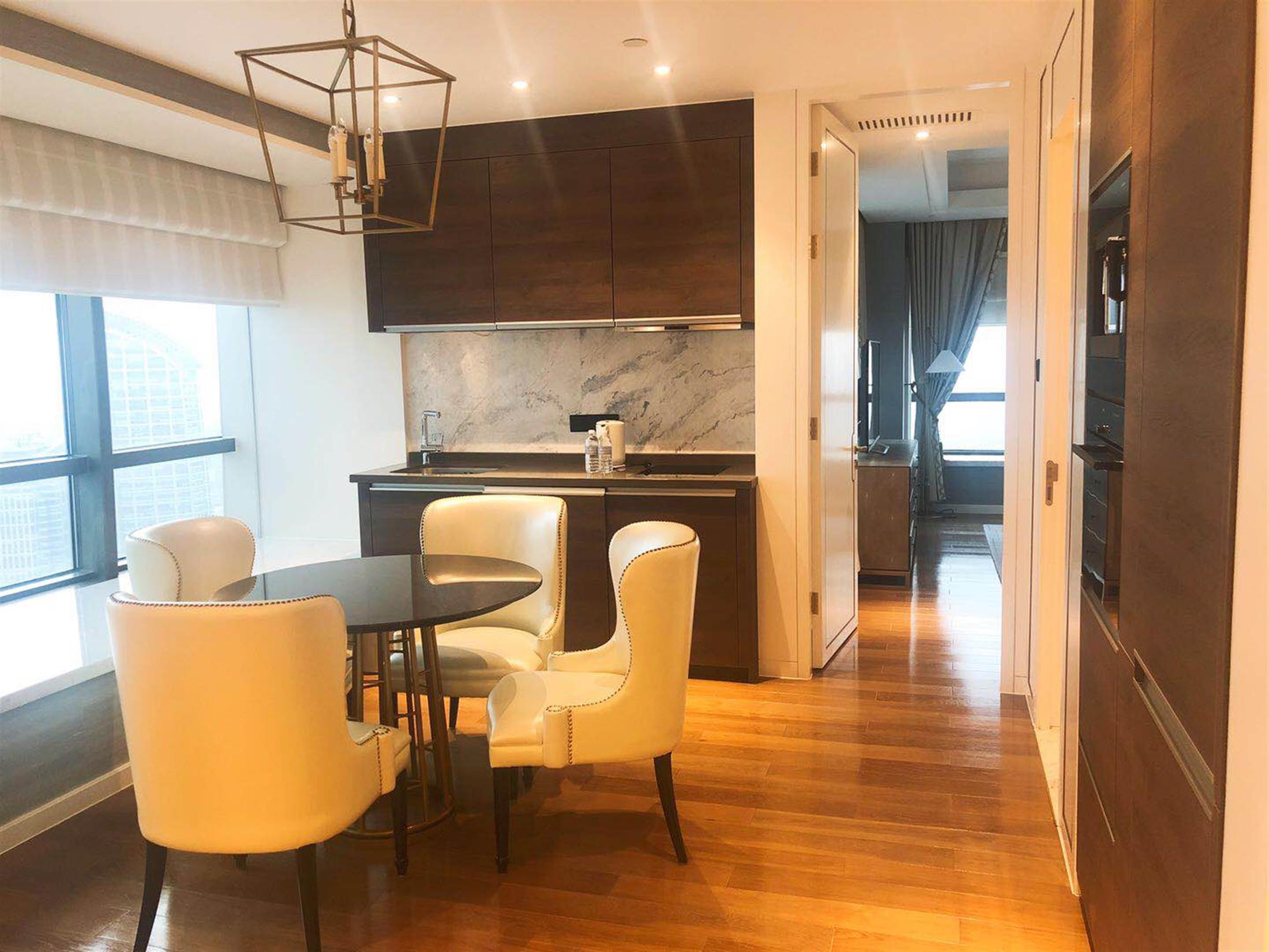 Open dining and kitchen area Top-End Ultra-Lux Service Apartment in Puxi