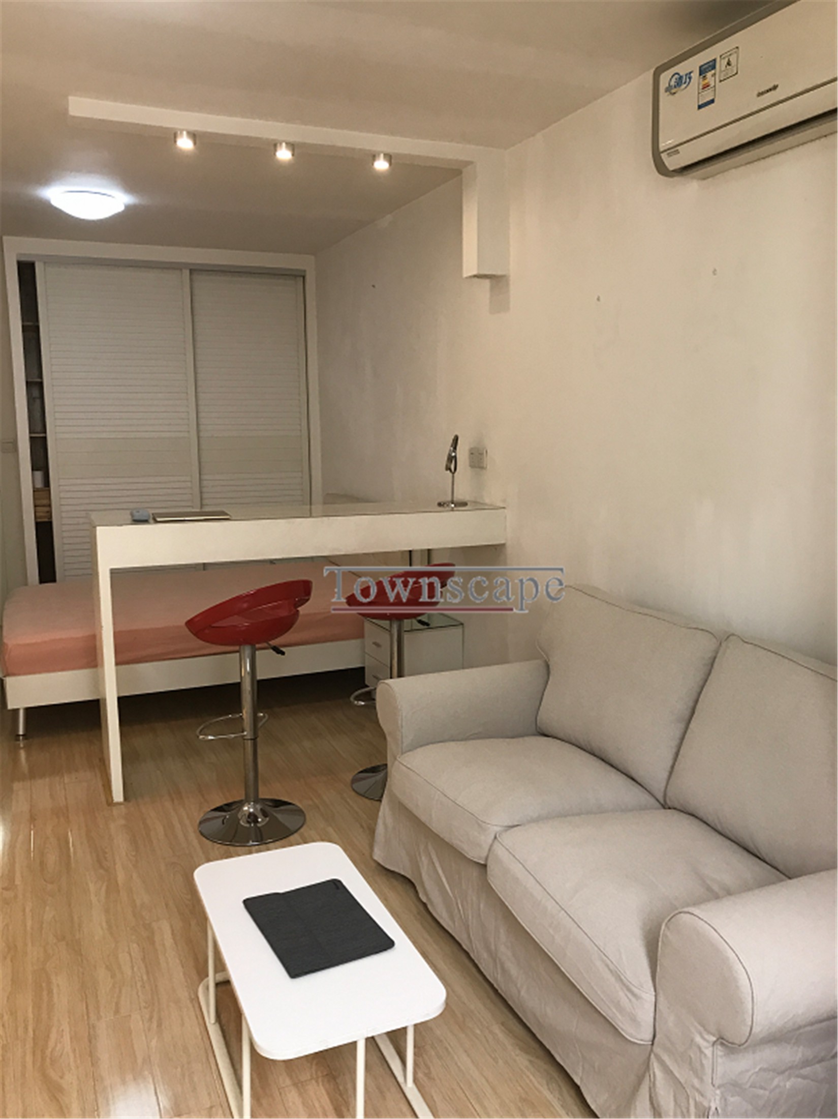 living area Stylish 1BR 5F Walk-up Apartment on W. Nanjing Road for Rent in Shanghai