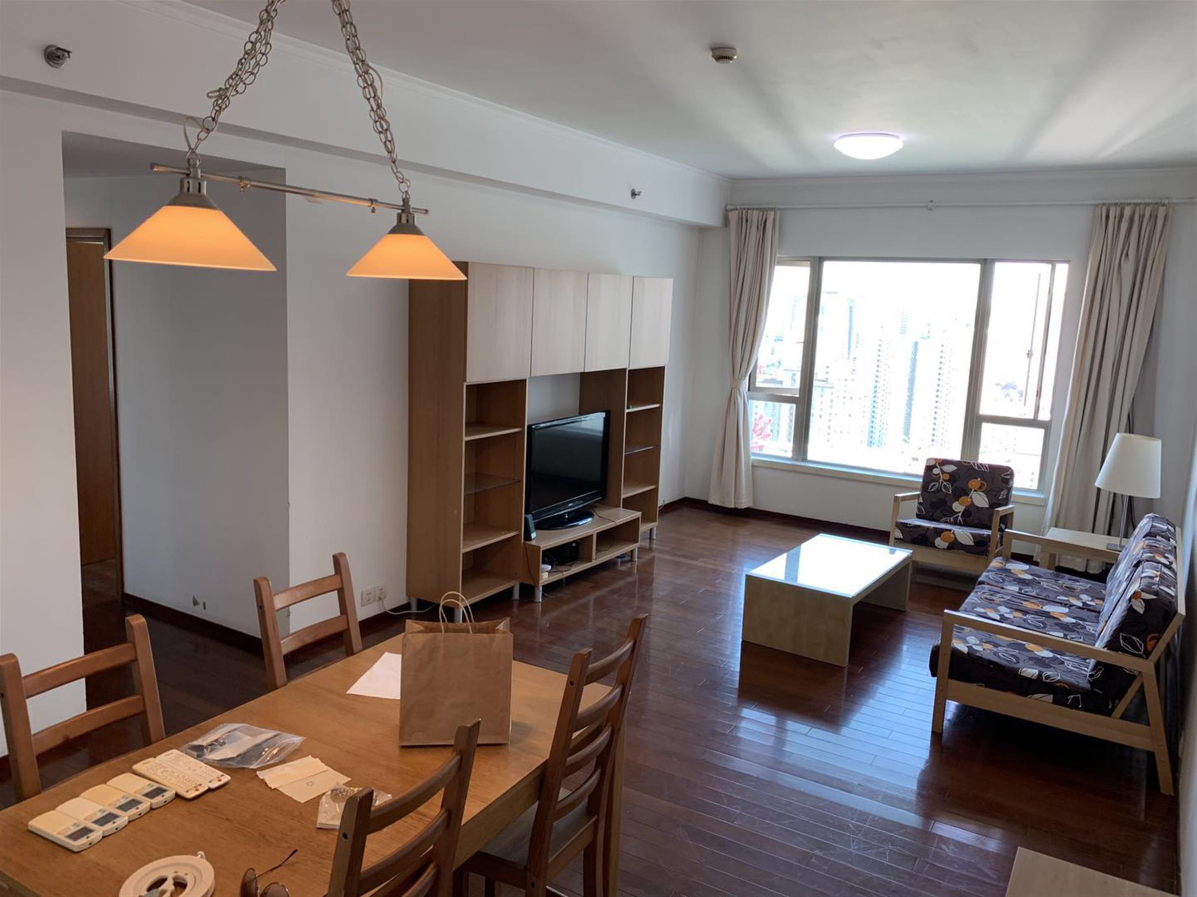 Sunny living room Bright Large Apartment w Great Views in Xujiahui Shanghai for Rent