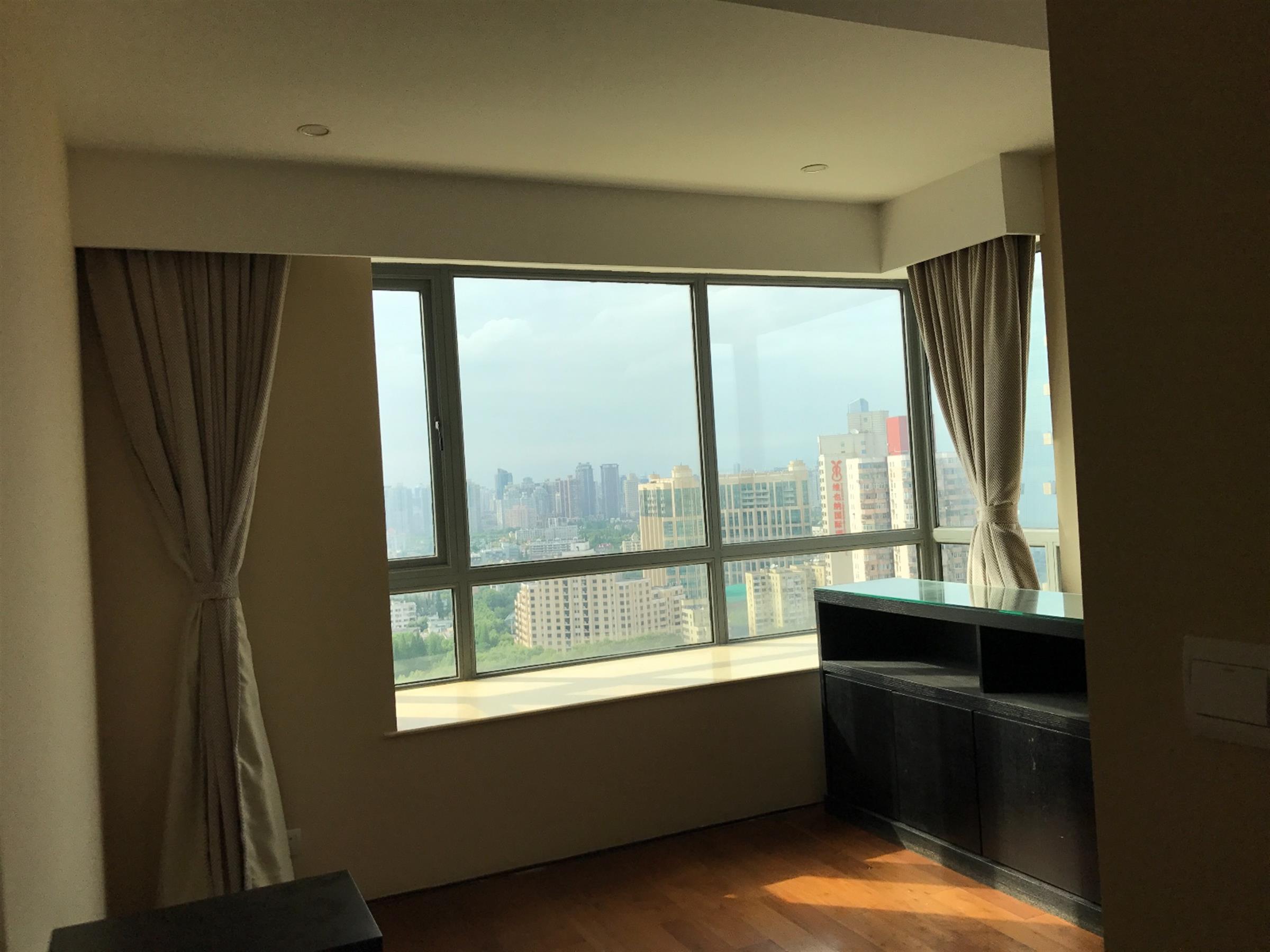 large bay windows Large Xujiahui Apartment w 2 Balconies & Great Views
