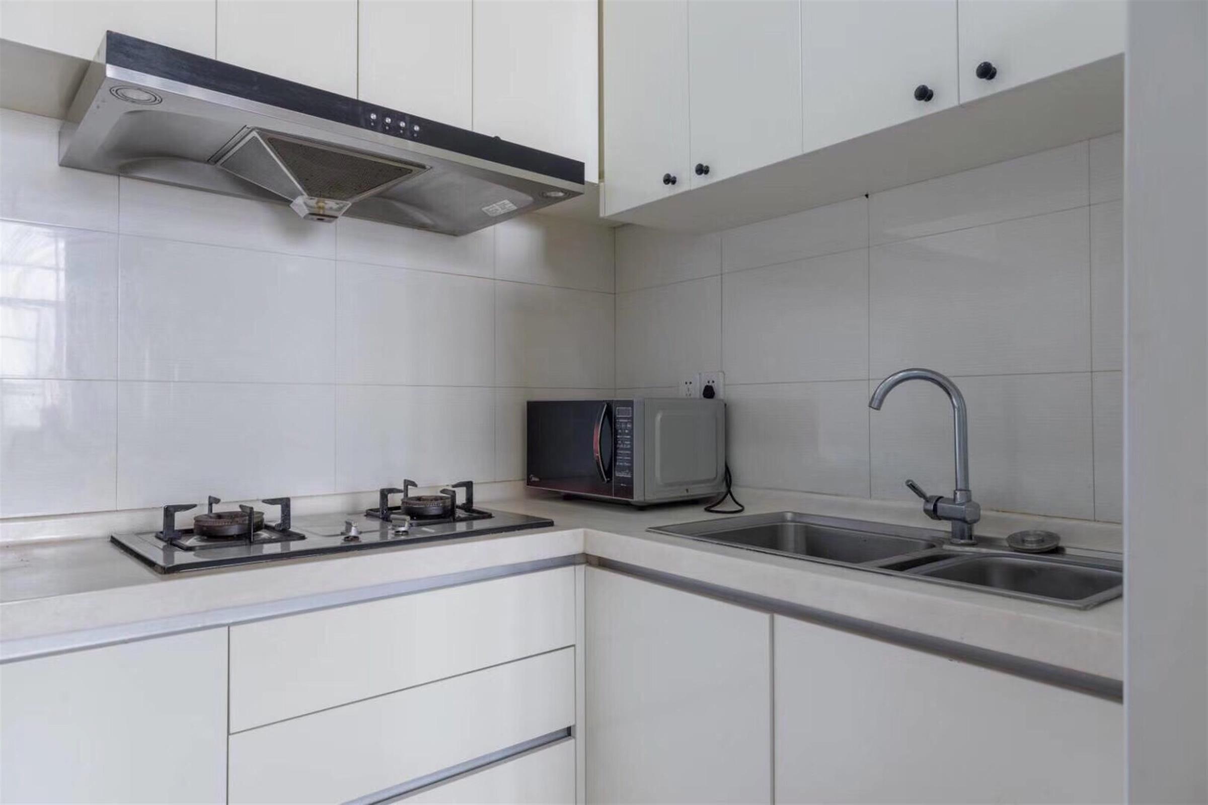 open kitchen Bright Modern 1BR Bund Apartment w Loft for Rent in Shanghai
