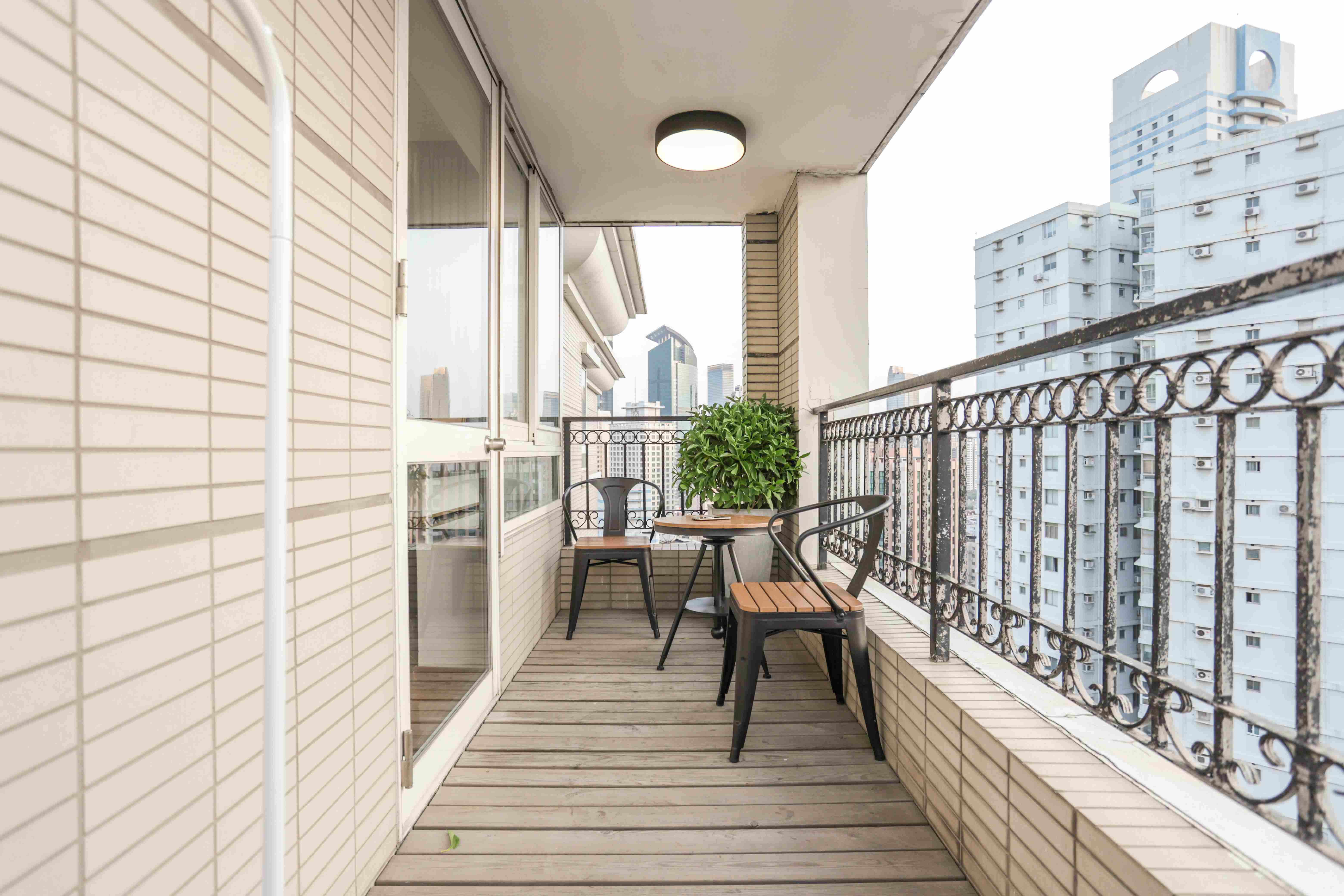 balcony views Large Sleek Modern 1BR Apartment for Rent in North Jing’an Shanghai
