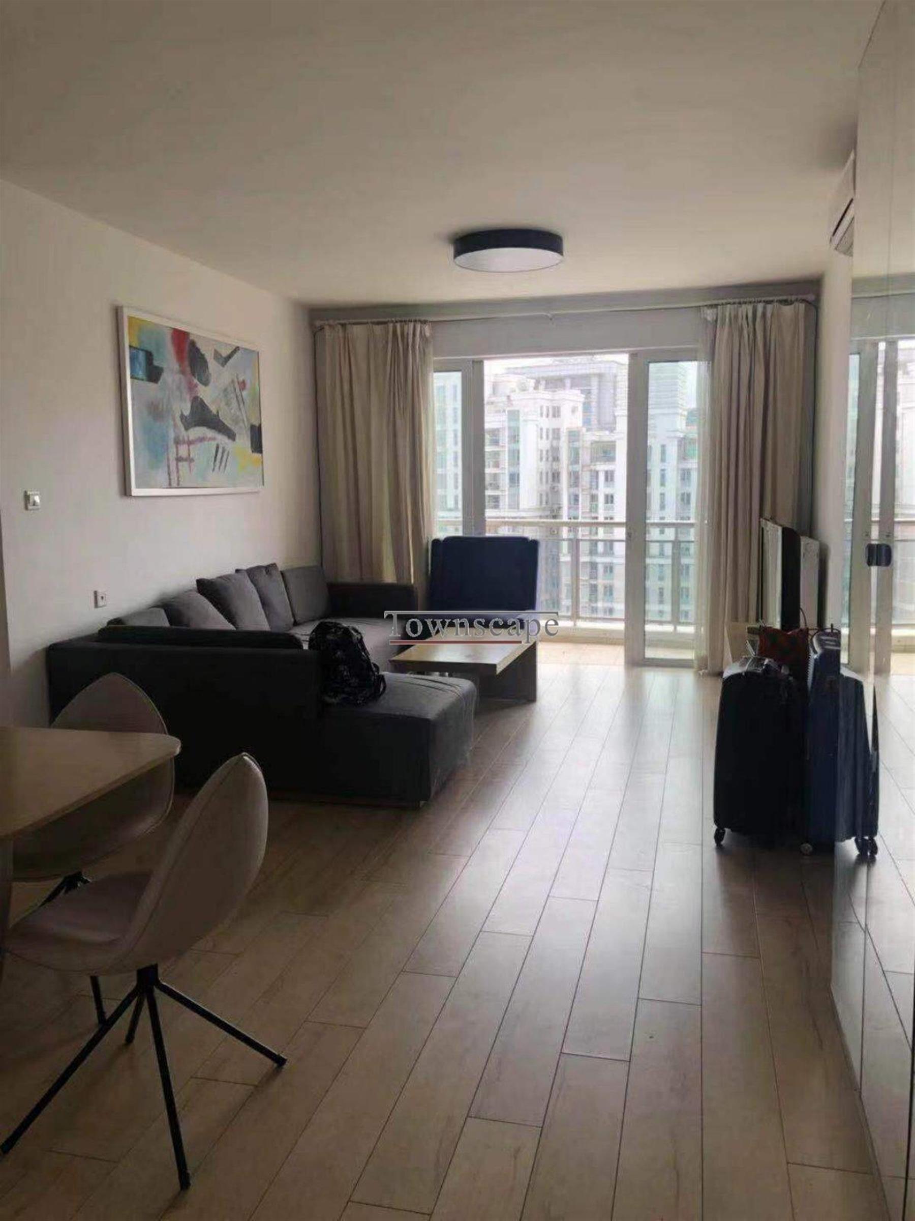 open living room Newly Renovated High Floor Apt w Great Views in Xujiahui La Cite for Rent