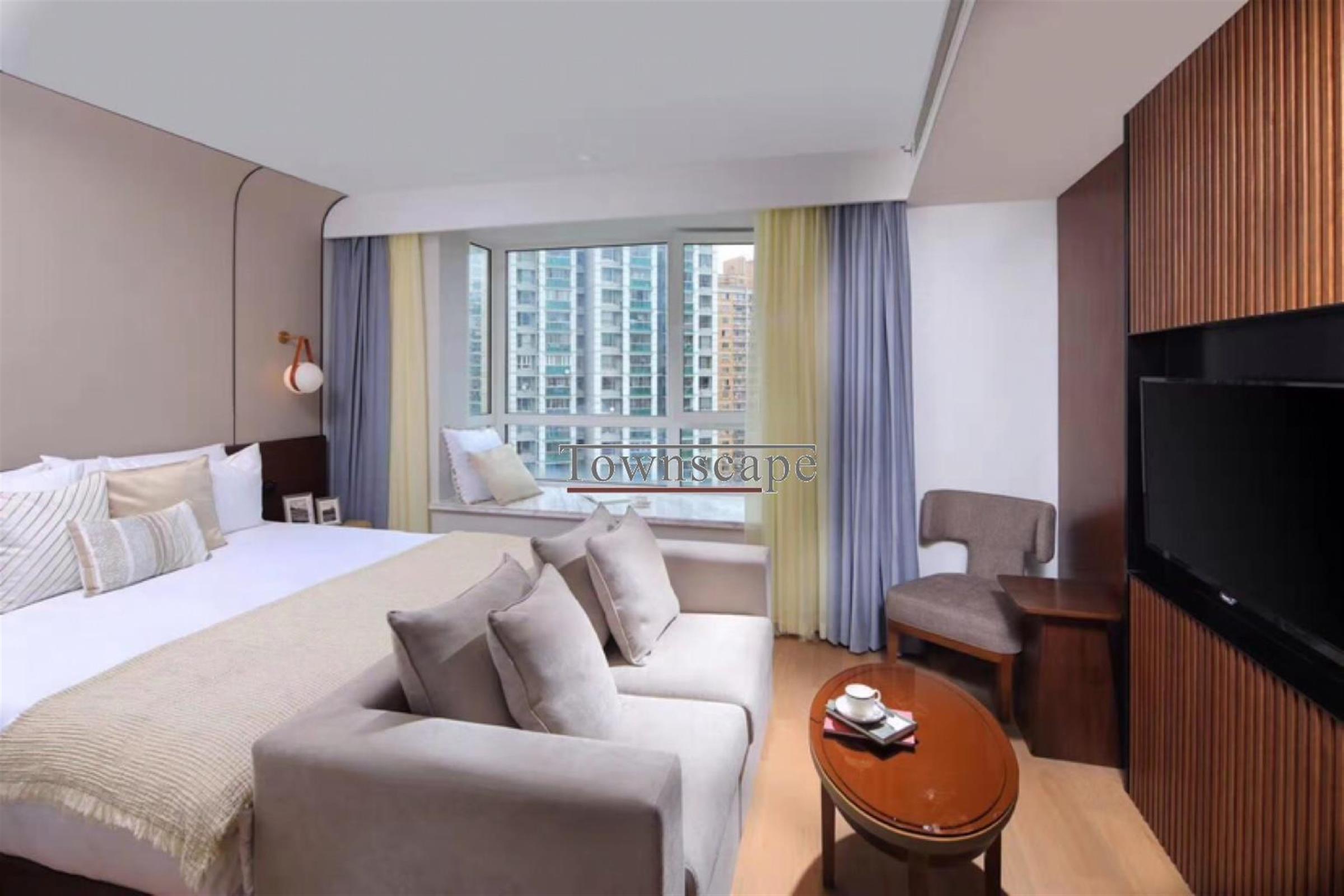 big bed Beautifully Decorated, Newly Opened 1BR Service Apartments in Jing