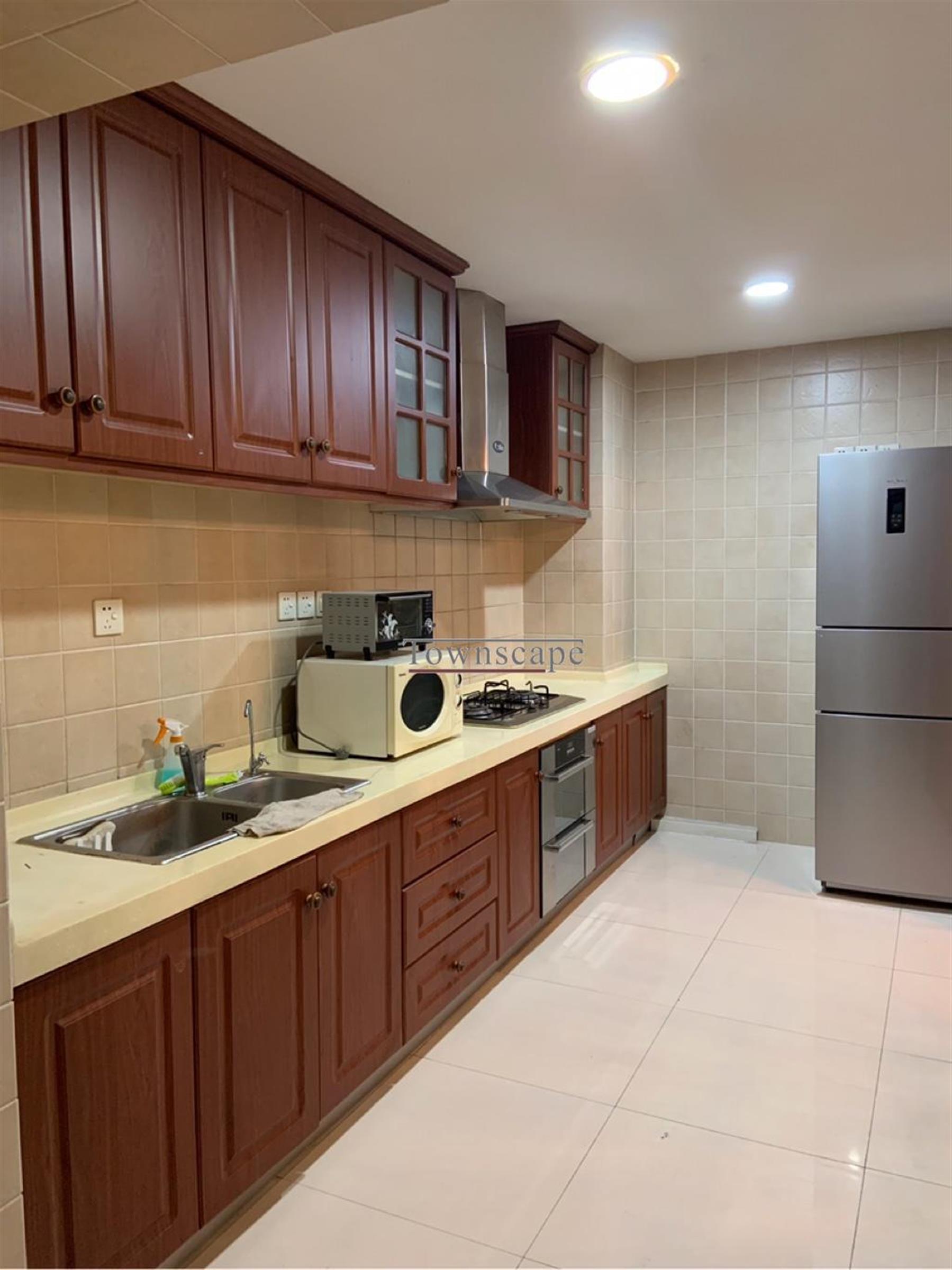Long Kitchen Elegant 3BR Classically Furnished Gubei Apt for Rent in Shanghai