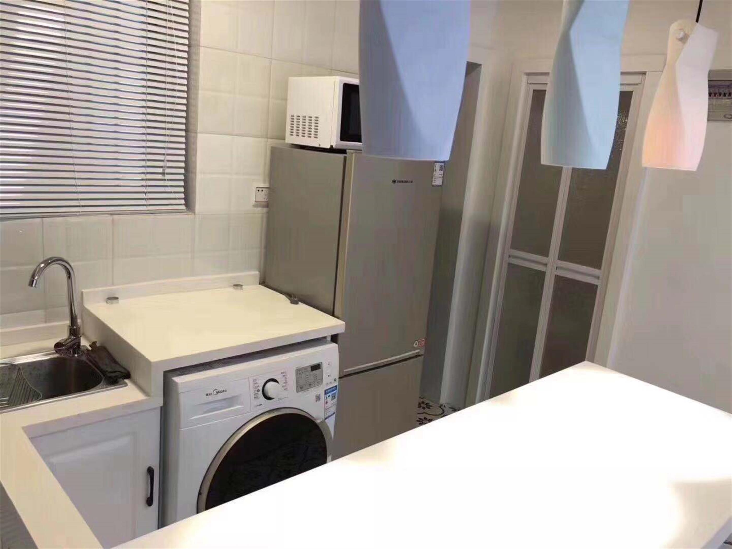 washer/drier Attractive Quiet 1F FFC 1BR with Back Patio for Rent in Shanghai Lane House