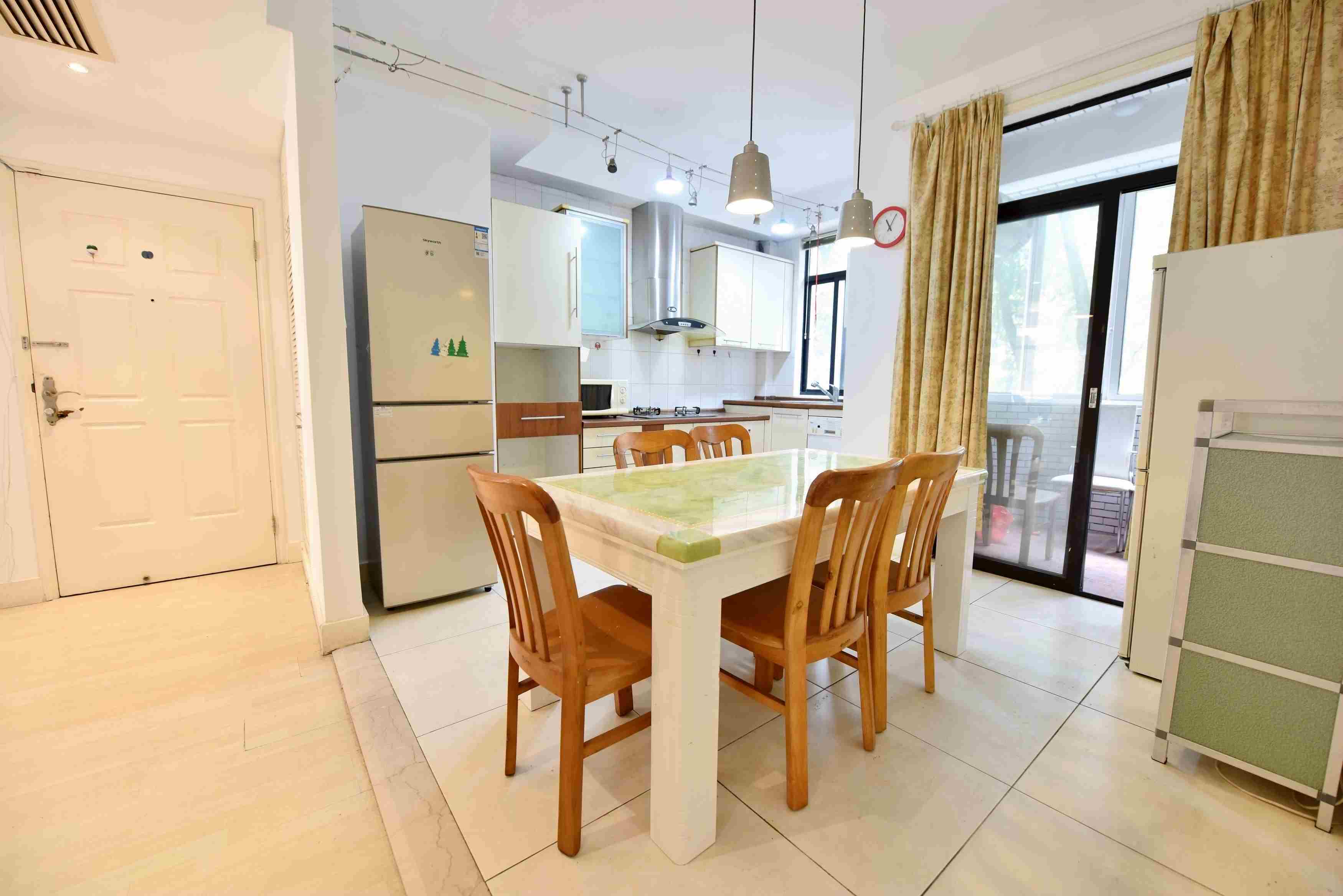 Open dining and kitchen area Bright Spacious 3BR Gubei Apartment for Rent in Hongqiao Shanghai