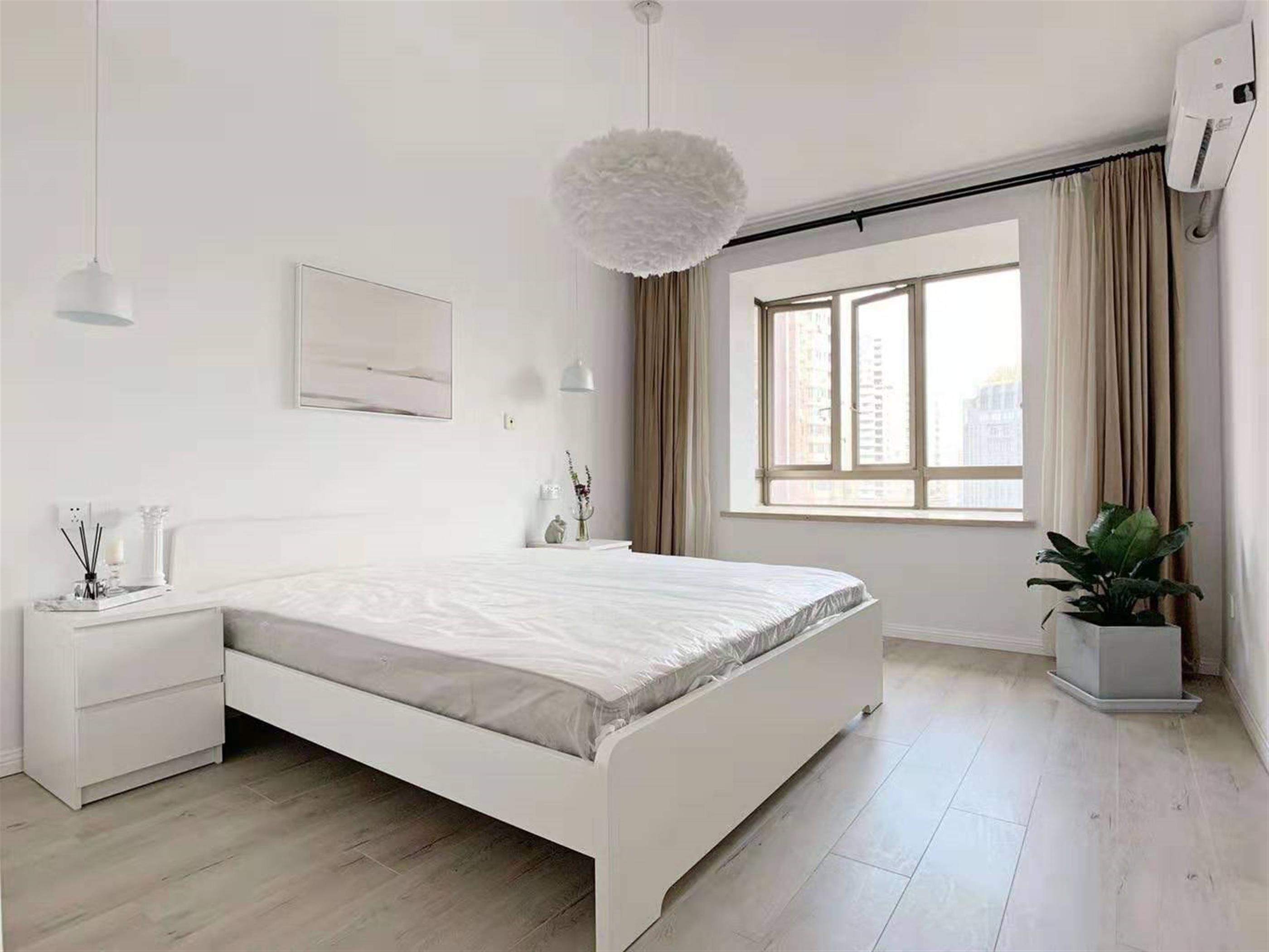 bright bedroom Modern Bright Spacious Suzhou Creek Apartment for Rent in Jing