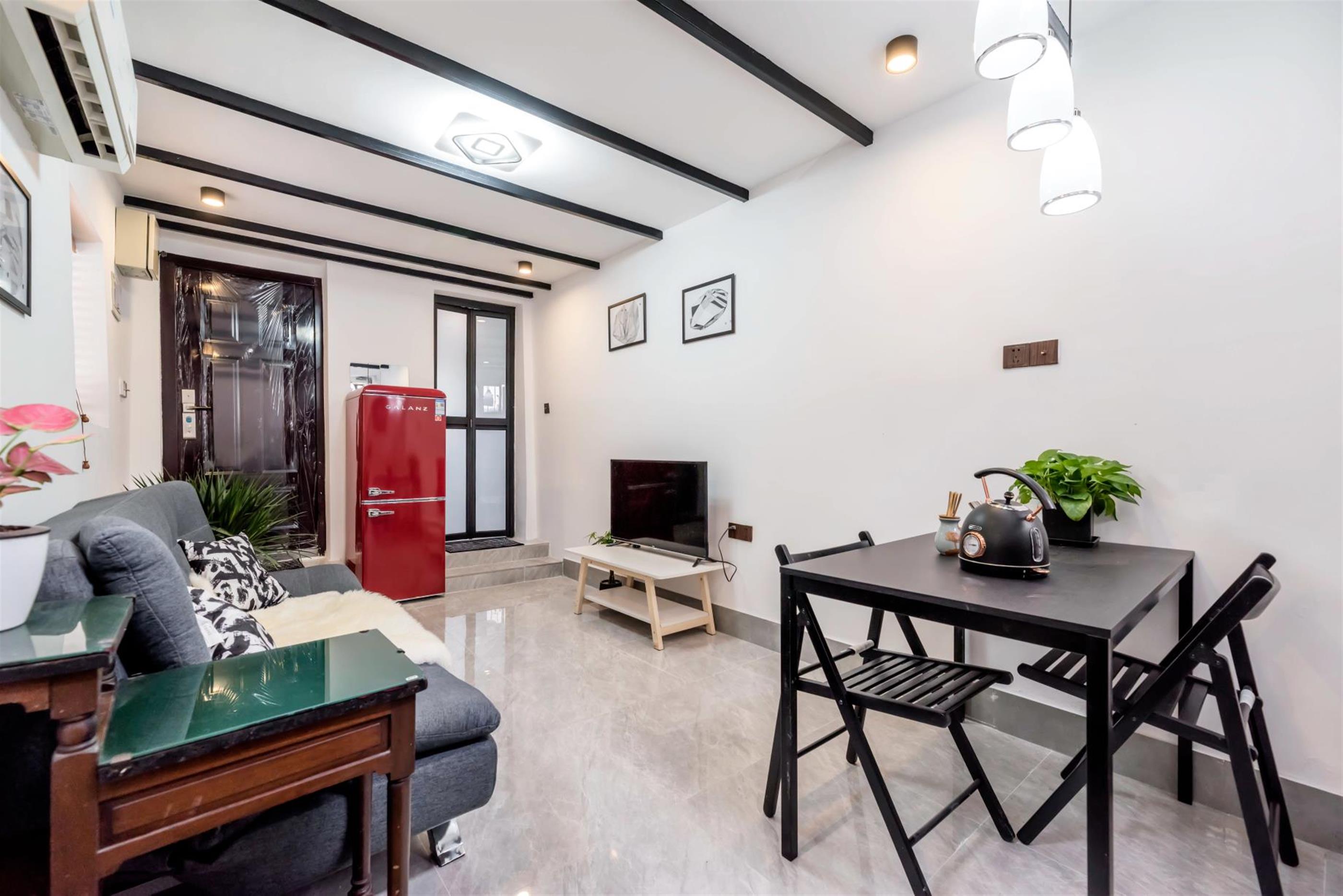 large living room Cozy Bright FFC 1BR Lane House Duplex w Terrace for Rent in Shanghai