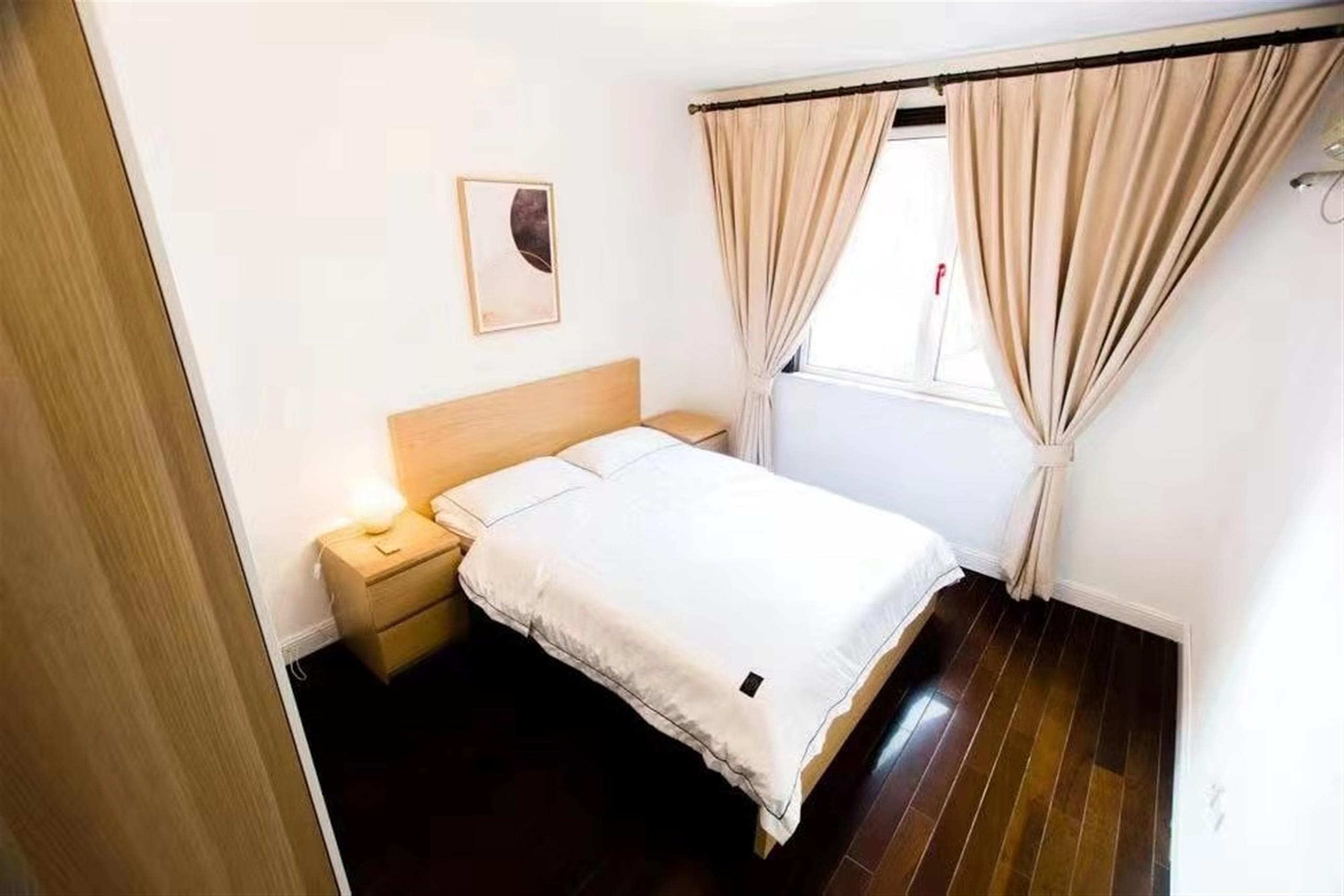 big bed Large 2BR Apartment nr LN 2/3/4 in Shanghai’s Xinhua Road Area for Rent