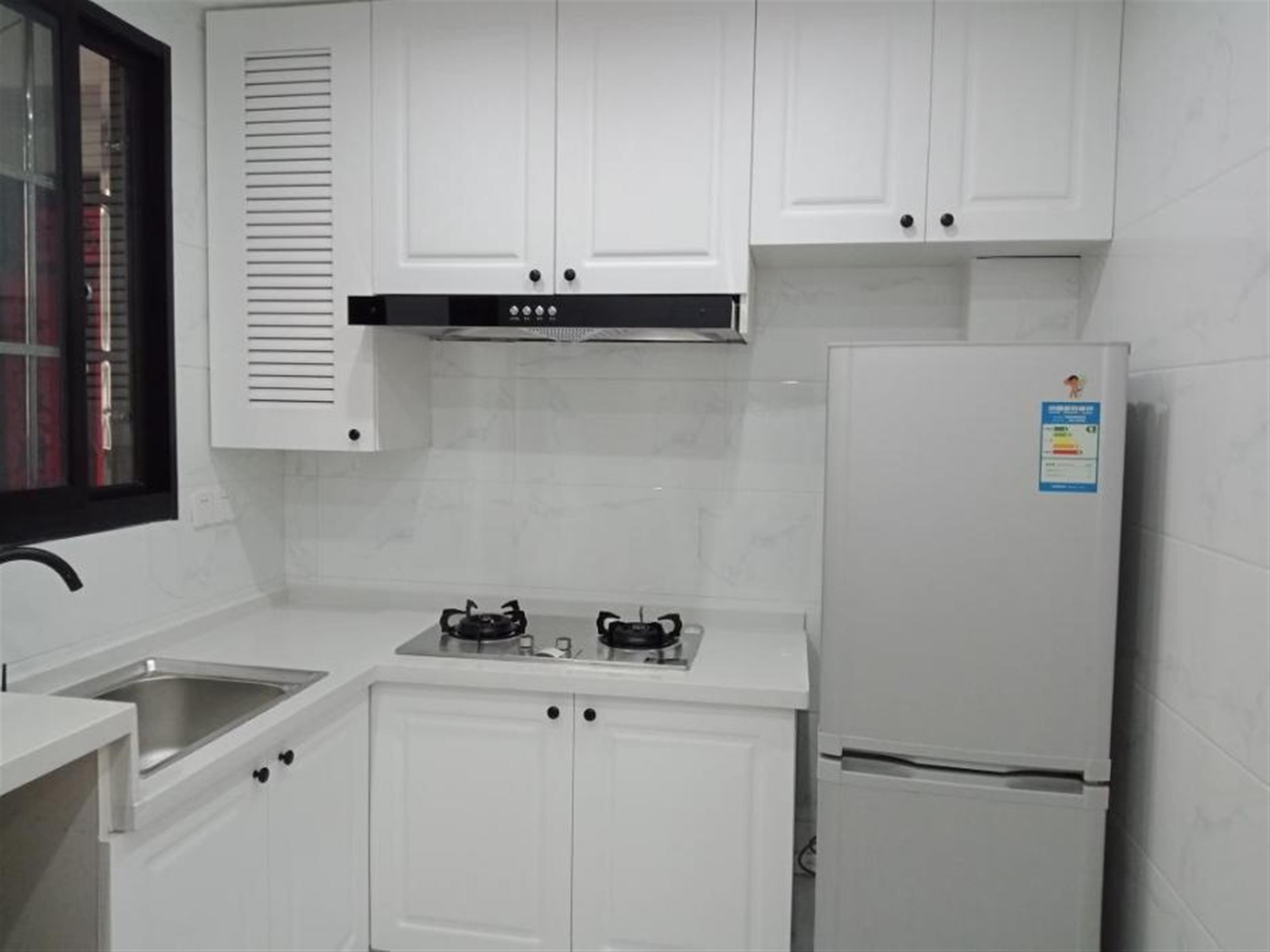 clean kitchen Renovated Cozy Budget 1BR Apt nr Jiangsu Rd LN2/11 for Rent in Shanghai