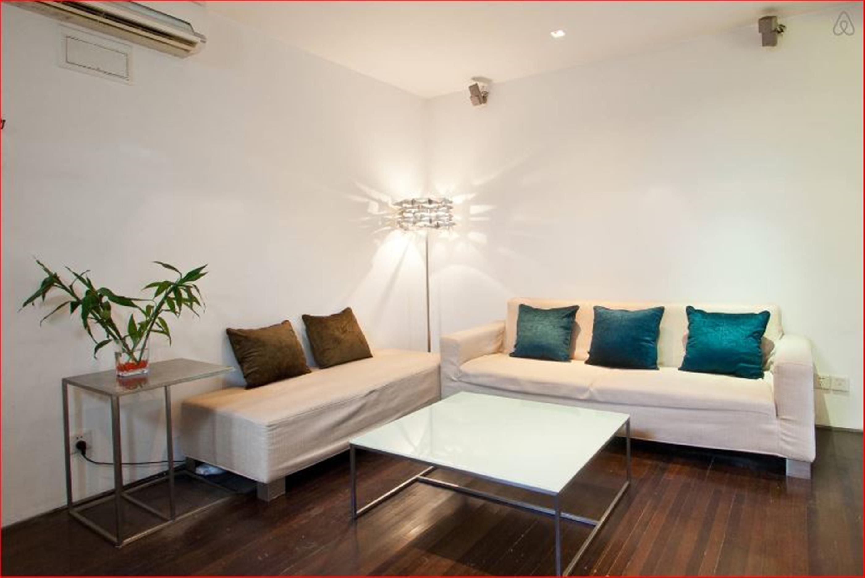 open living room Renovated Bright Spacious Modern FFC 1BR Apt nr LN1/2/7/10/11 in Shanghai for Rent