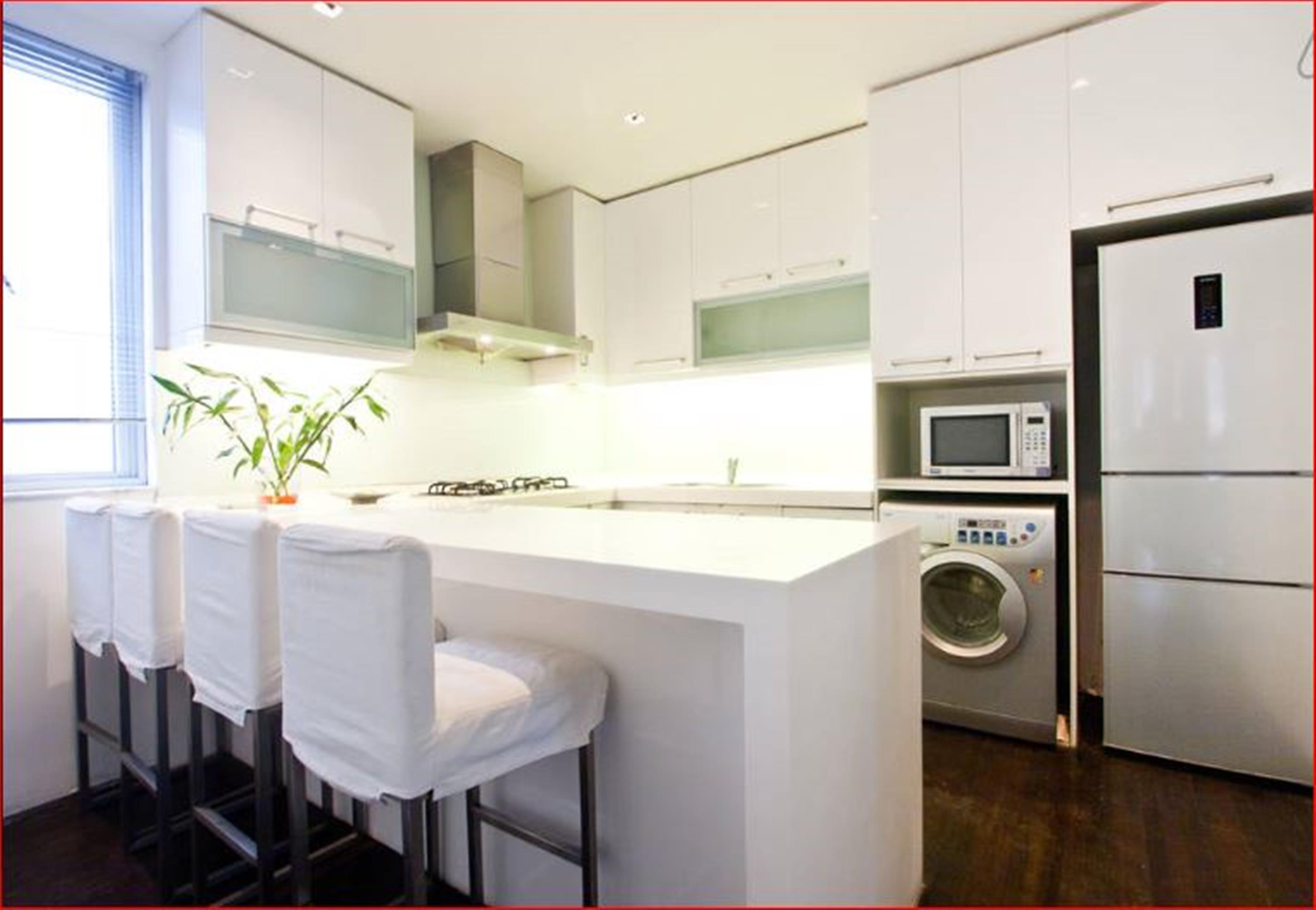 open kitchen Renovated Bright Spacious Modern FFC 1BR Apt nr LN1/2/7/10/11 in Shanghai for Rent