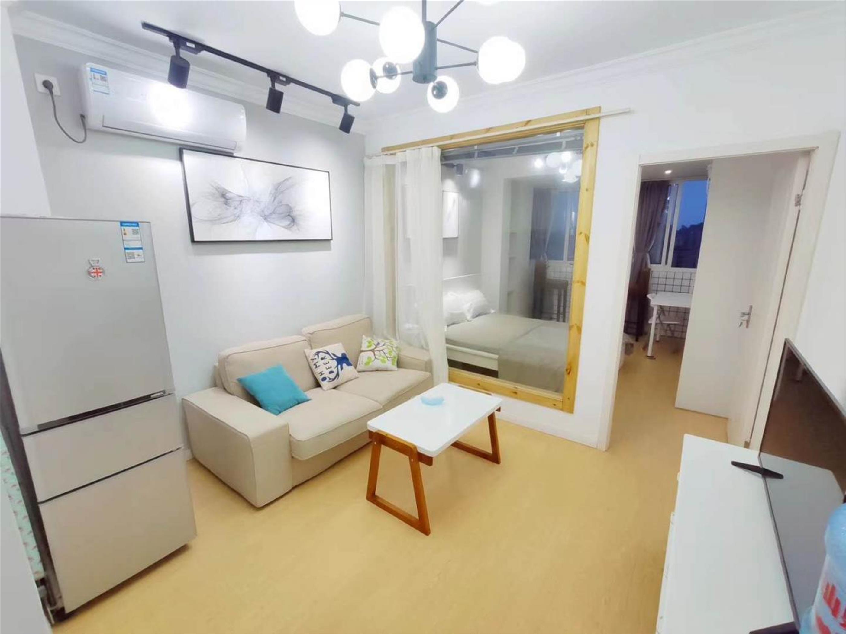 Large living room Bright Clean Affordable Huaihai Road 2BR Apt Nr LN 1/10/12/13 for Rent in Shanghai