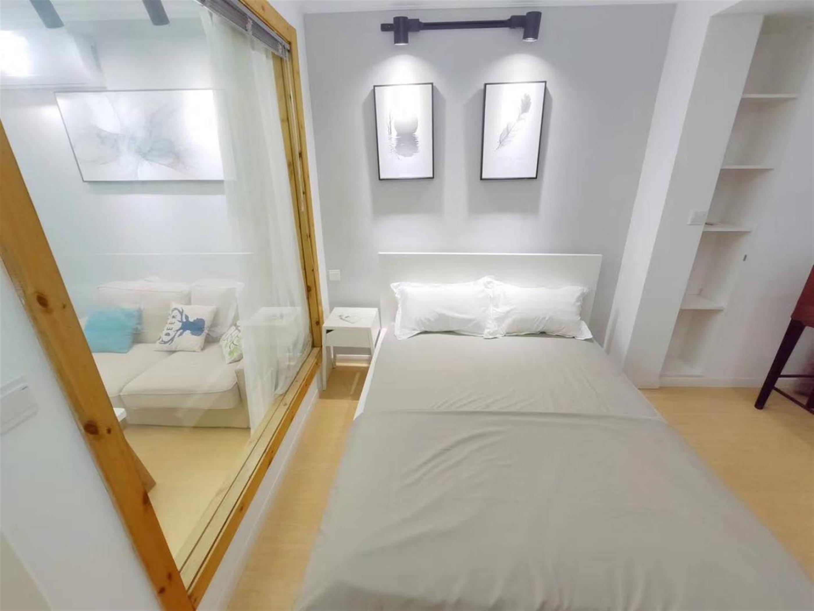 big bed Bright Clean Affordable Huaihai Road 2BR Apt Nr LN 1/10/12/13 for Rent in Shanghai