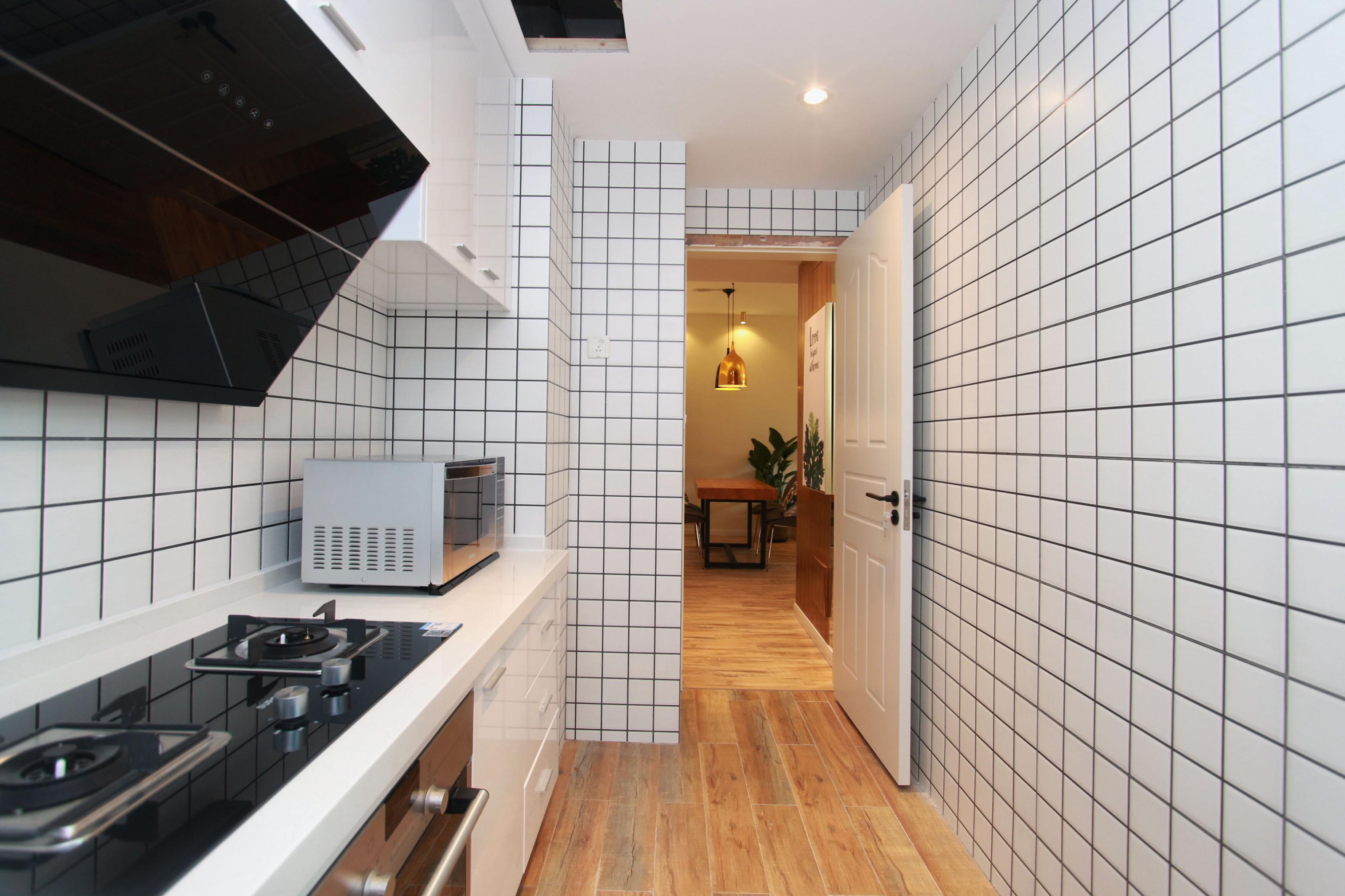 large kitchen Renovated Modern High-end Ladoll 1BR Apt LN 2/12/13 for Rent in Shanghai