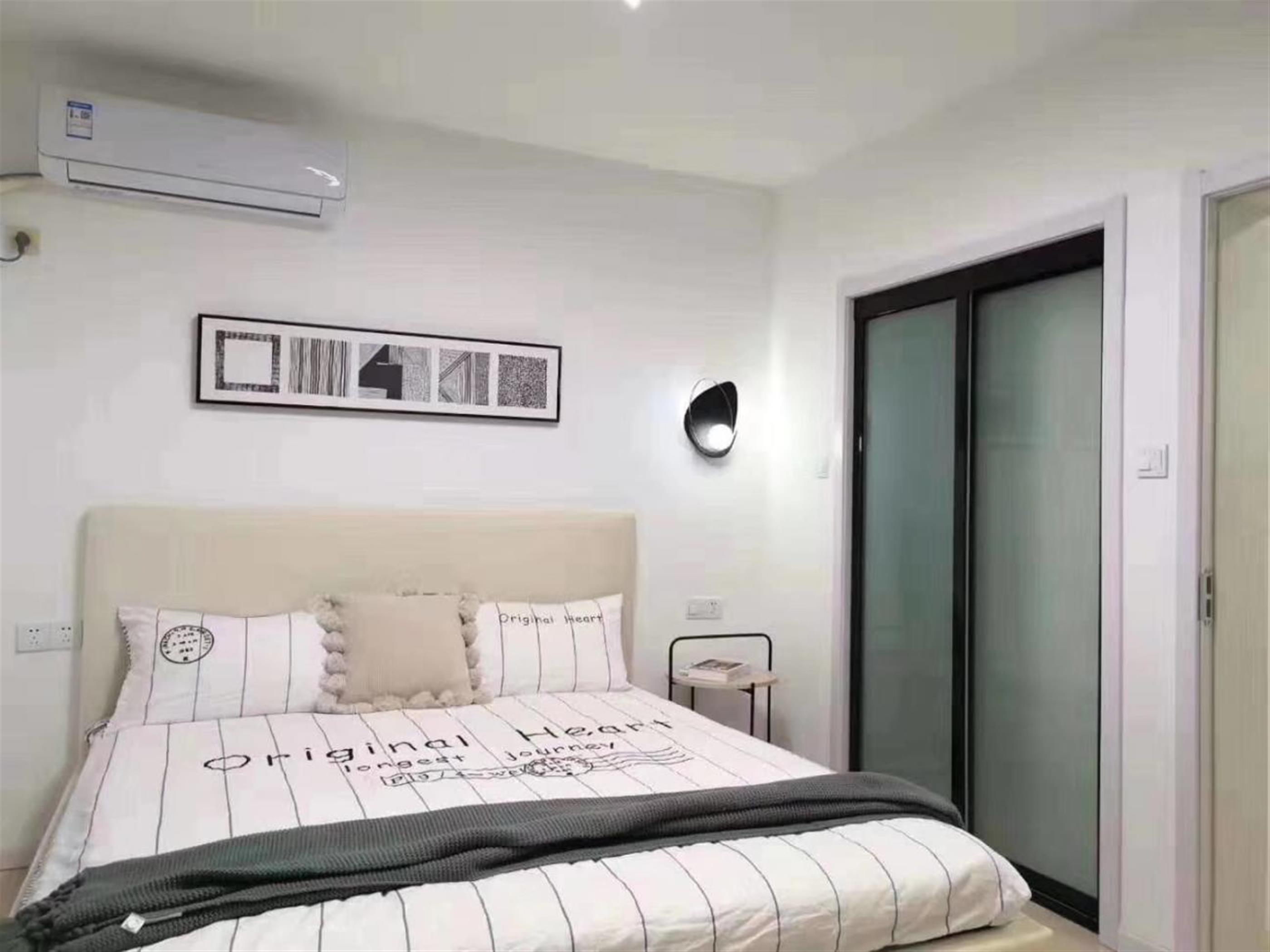 Big bed Sleek Modern 1BR Apartment Nr LN 3/4 for Rent in Shanghai