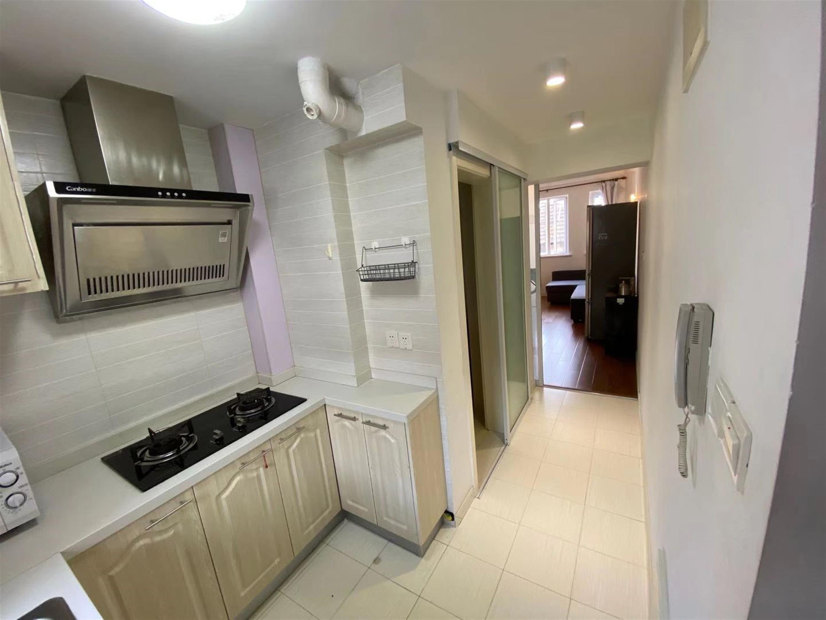 open kitchen Fantastic Location, Jing’an Duplex Apt w Terrace Nr LN 2/7/12/13 for Rent in Shanghai