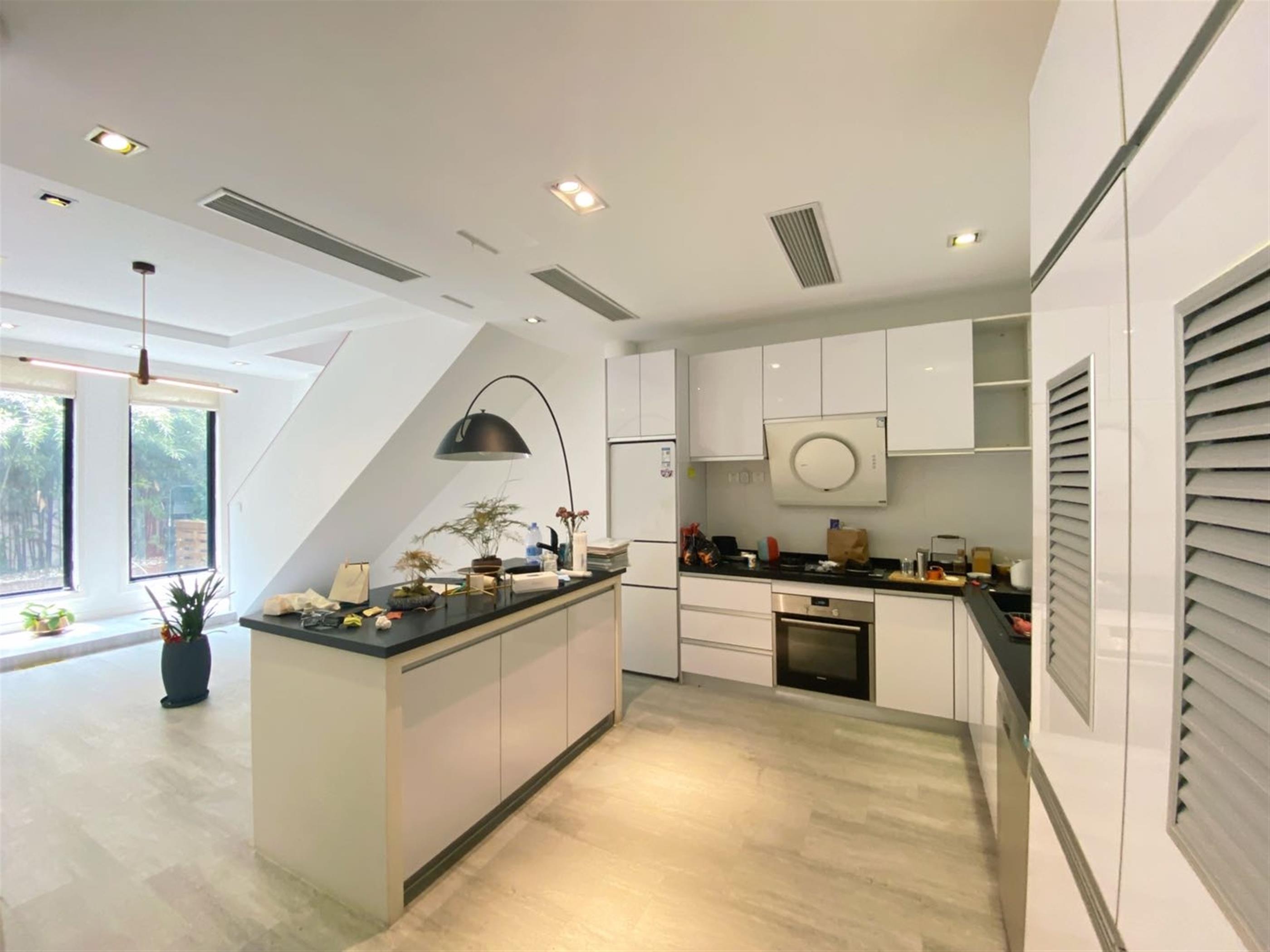 open kitchen Renovated 5BR 3-floor FFC Lane House for Rent near Shanghai’s Xinhua Rd Neighborhood