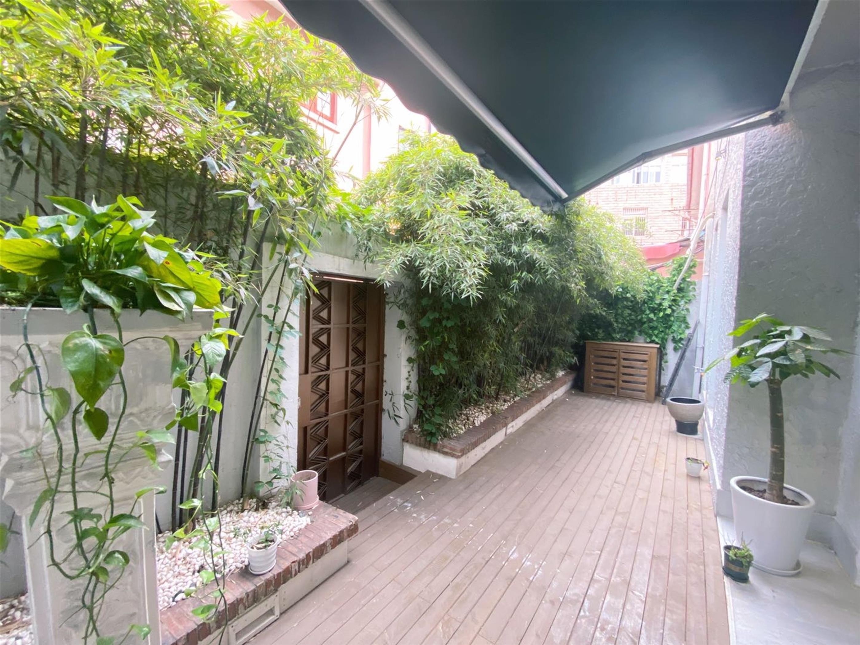 Front courtyard Renovated 5BR 3-floor FFC Lane House for Rent near Shanghai’s Xinhua Rd Neighborhood